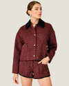 Women's Norma Check Jacket featuring a classic check pattern, contrast collar, long sleeves, snap-button closure, and front pocket.