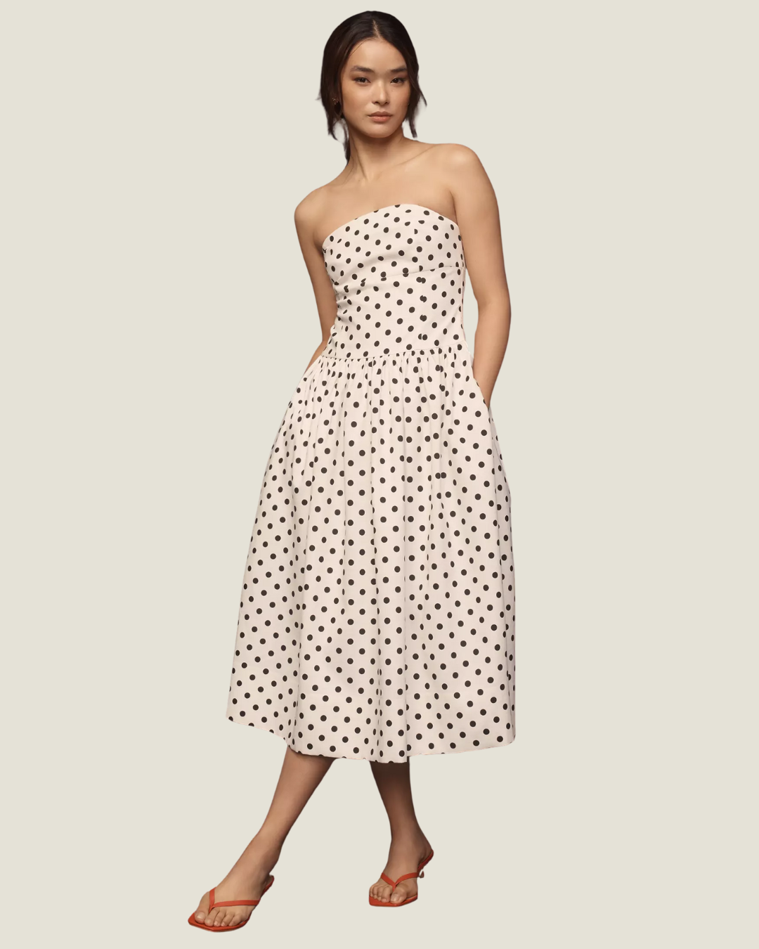 The Juliana Strapless Polkadot Midi Dress- a strapless dress with a drop waist by Endless Rose.Available at Love Celine a women’s boutique in SWFL.
