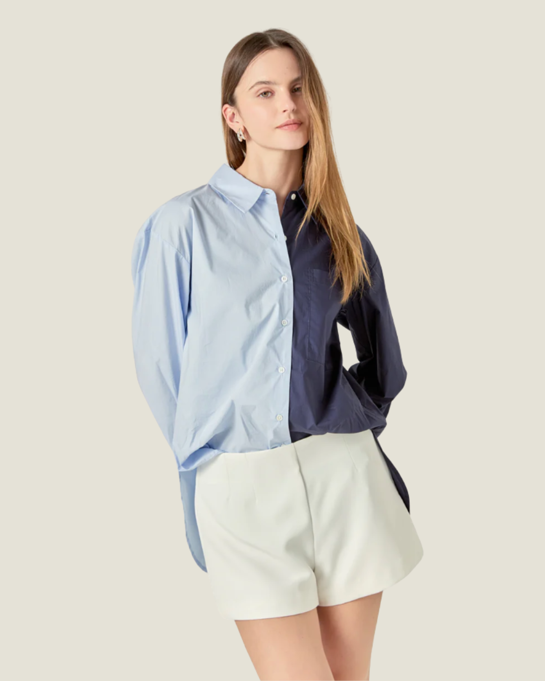 Brooks Colorblock Button-Down a navy & powder blue shirt made for everyday wear.  Available at Love Celine a women’s boutique in SWFL.