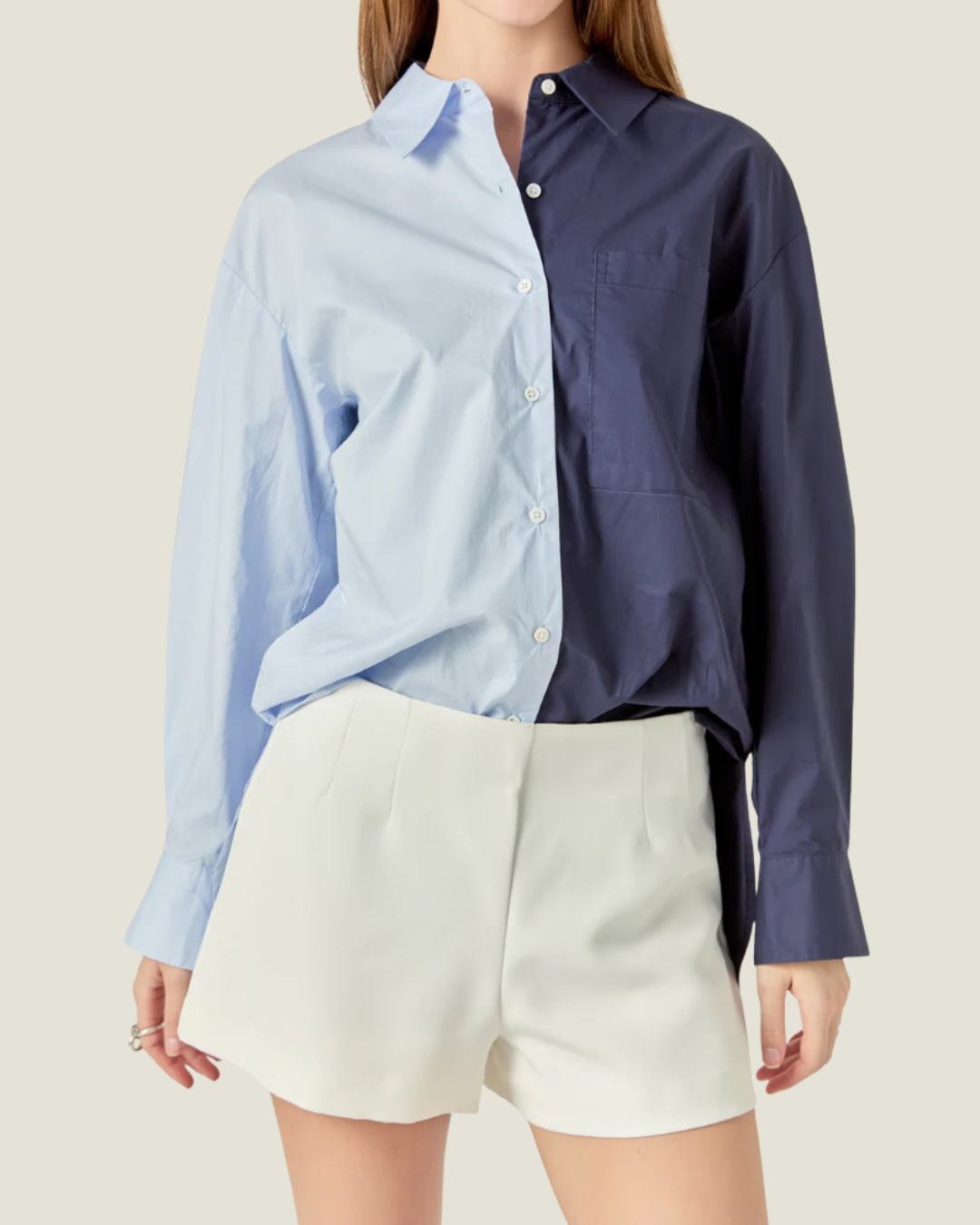 Brooks Colorblock Button-Down a navy & powder blue shirt made for everyday wear.  Available at Love Celine a women’s boutique in SWFL.